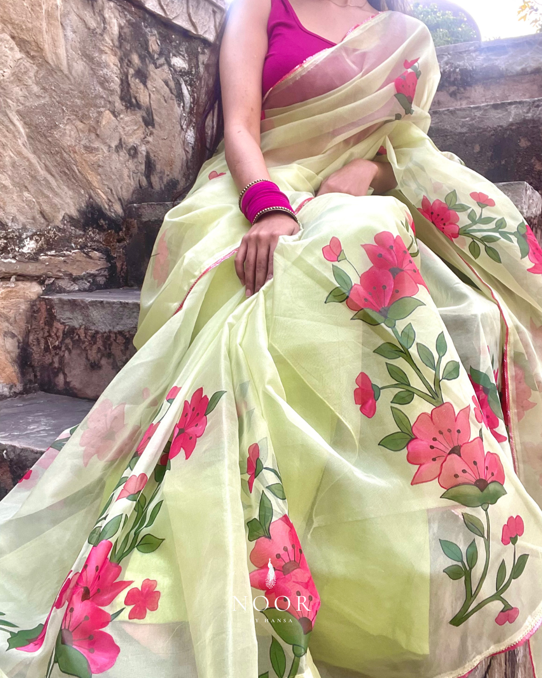 hand painted saree in pure organza silk by noor by hansa in pistachio green colour paired with a pure cotton blouse piece
