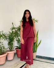 cotton wine noor by hansa v-neck co-ord set that’s as comfy as your favourite loungewear but sharp enough for the office! hand-made from an ultra-soft cotton blend, it stays vibrant wash after wash with zero colour bleeding. perfect for those days when you want to feel cozy and look effortlessly chic!