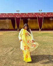 hand painted saree in pure organza silk by noor by hansa in yellow colour paired with a pure cotton blouse piece