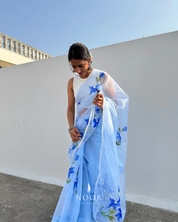 hand painted saree in pure organza silk by noor by hansa in sky blue colour paired with a white blouse piece
