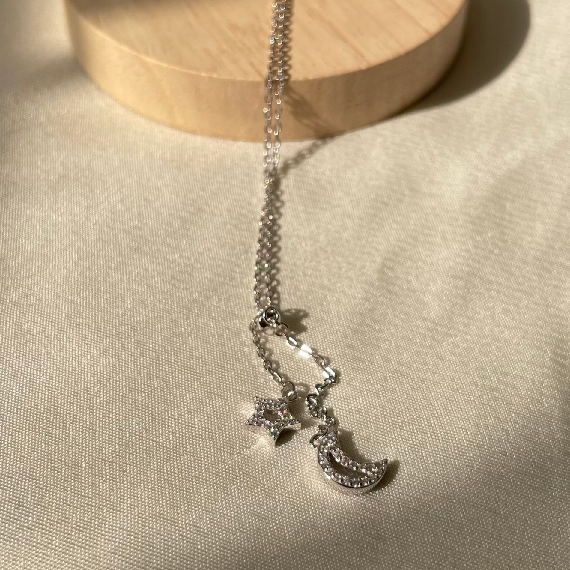 Zircon star moon locket