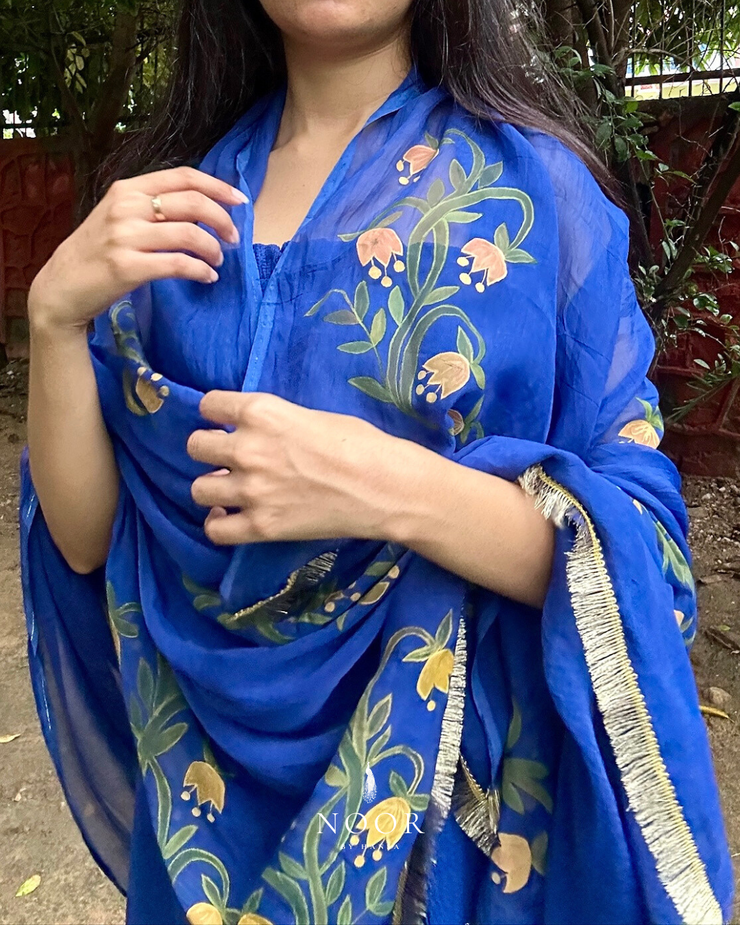 hand painted navy blue 'saba' dupatta in pure organza silk with hand-painted tulip motifs and golden laced borders