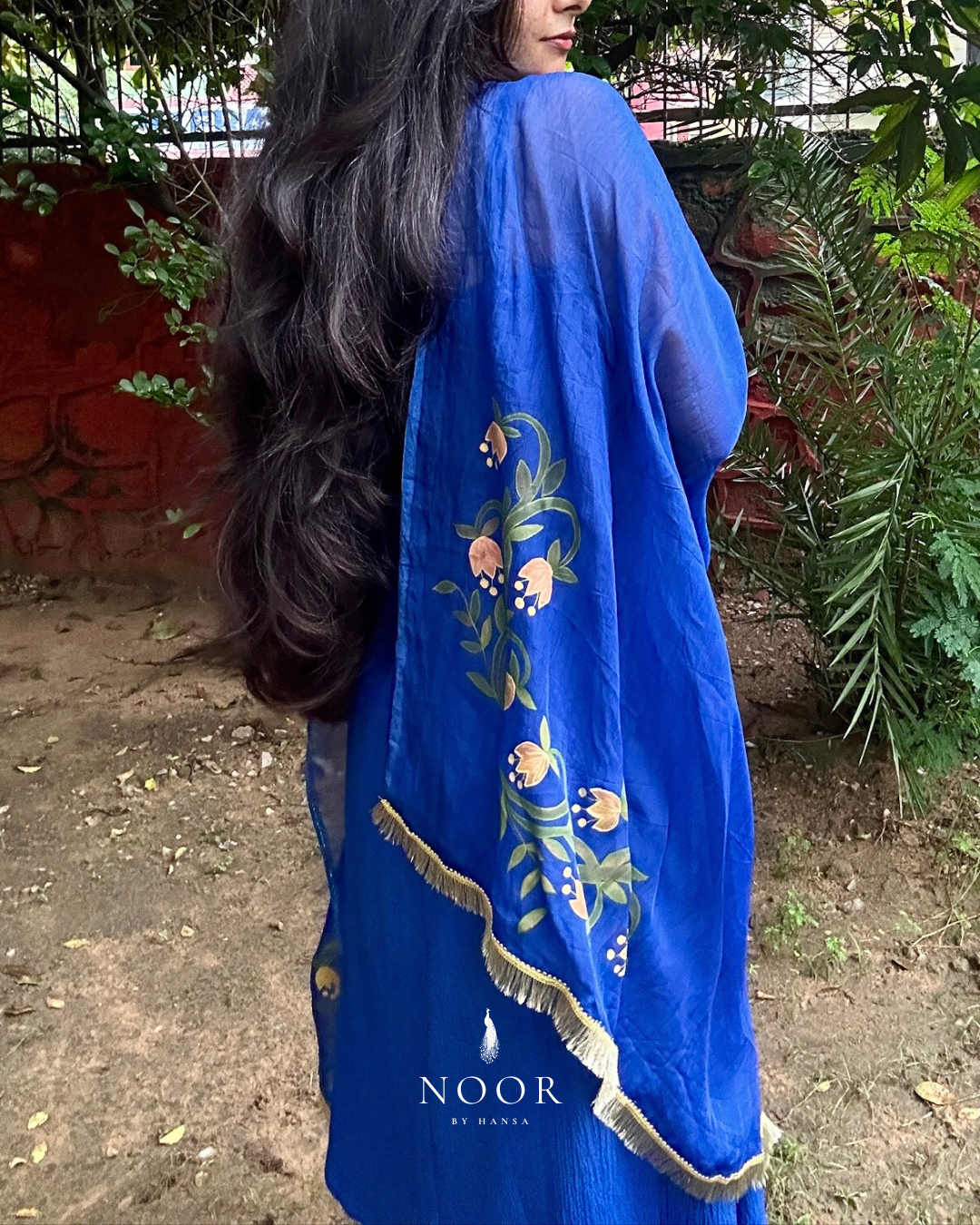 hand painted navy blue 'saba' dupatta in pure organza silk with hand-painted tulip motifs and golden laced borders
