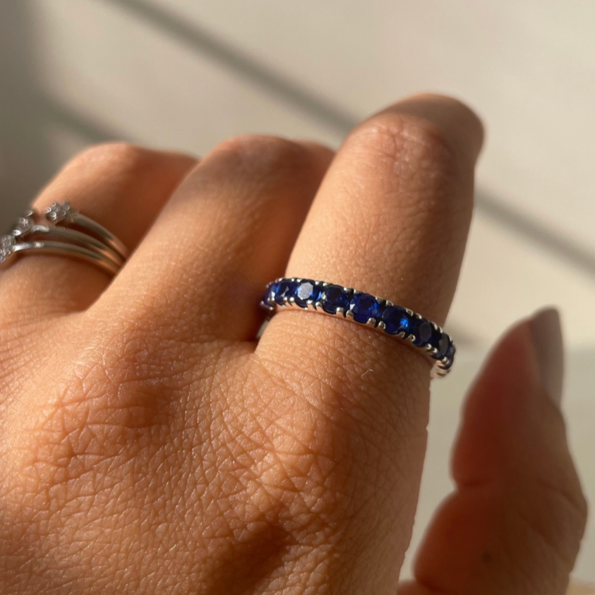 Blue zircon eternity band