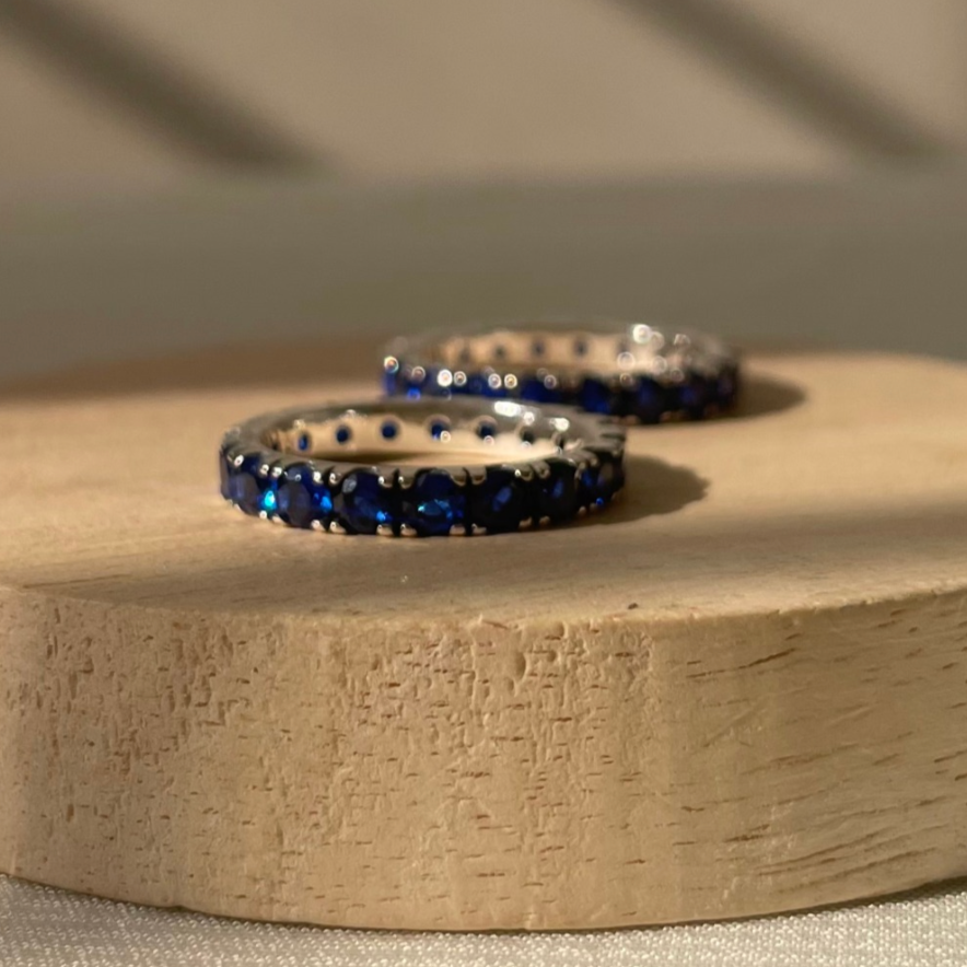 Blue zircon eternity band