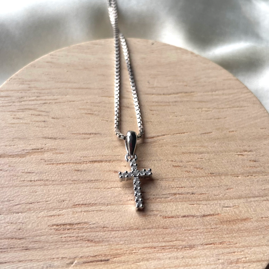 Zircon cross locket