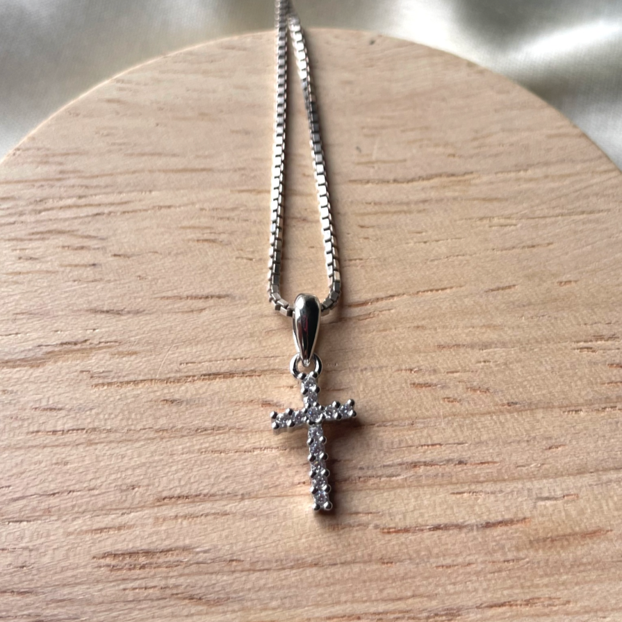Zircon cross locket
