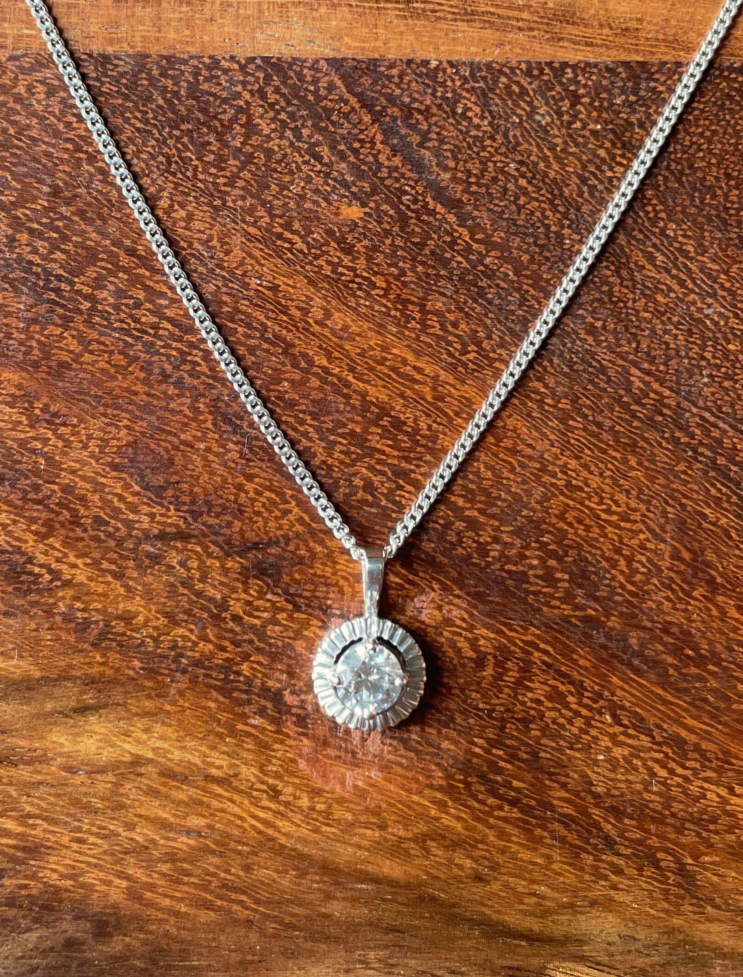 The Pendant of Balance - Zircon