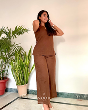 coffee brown cotton noor by hansa v-neck co-ord set that’s as comfy as your favourite loungewear but sharp enough for the office! hand-made from an ultra-soft cotton blend, it stays vibrant wash after wash with zero colour bleeding. perfect for those days when you want to feel cozy and look effortlessly chic!