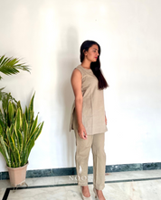 grey cotton linen noor by hansa kurta co-ord set, crafted from a luxe linen-cotton blend that feels as good as it looks. available in five vibrant colours, this playful set is perfect for office wear or a day full of running errands